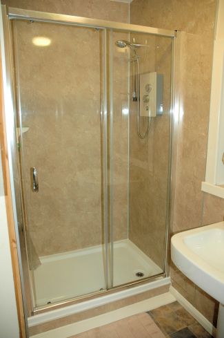 The bathroom in Bruaich Cottage is on the ground floor just off the hall.