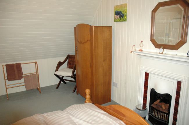 The bedrooms in Bruaich Cottage have pine-lined walls and ceilings and are cosy and welcoming. There are superb views from the bedroom windows.