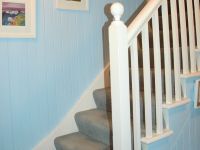 The bedrooms have pine-lined walls and ceilings and are cosy and welcoming. There are superb views from the bedroom windows.